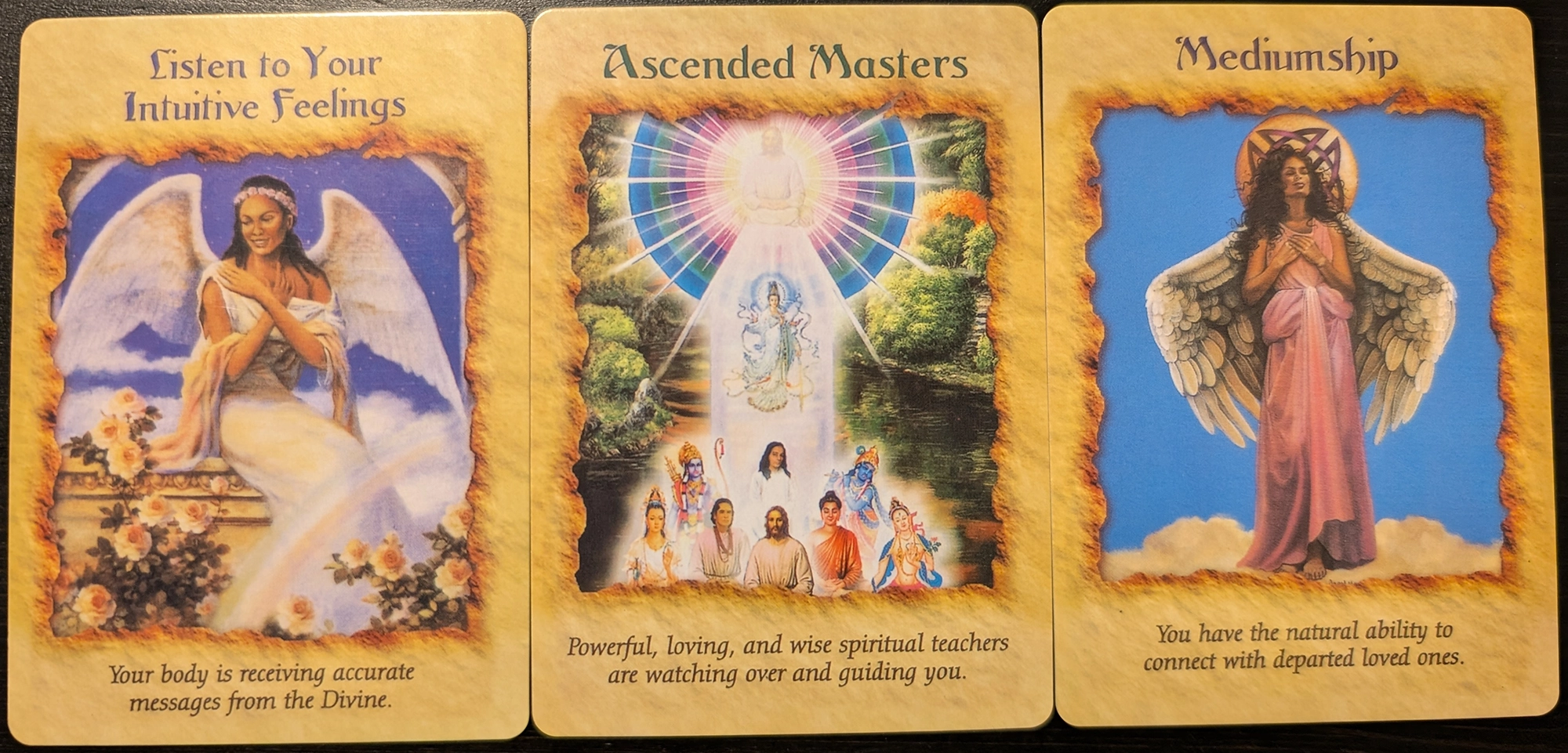 3 cards from the Angel THerapy Oracle Cards of: Listen to your intuitive feelings, Ascended Masters, Mediumship.