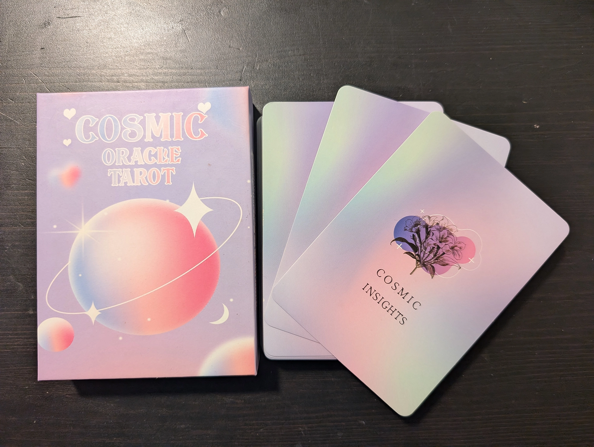 Cosmic Oracle deck box and back of card stack