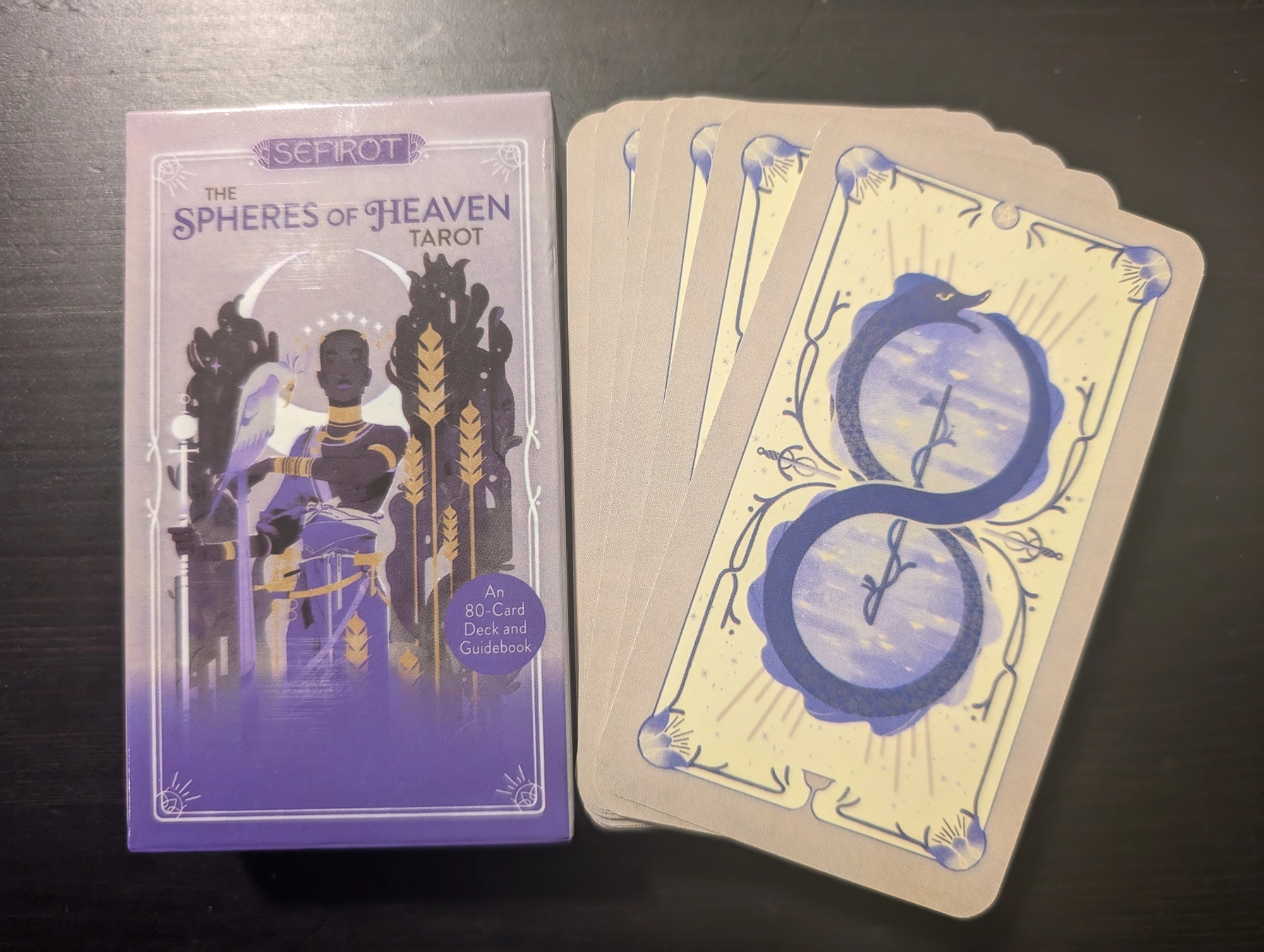 The Spheres of Heaven Tarot deck box and back of deck stack