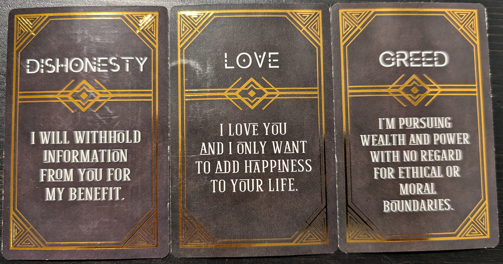 3 cards from the True Intentions Oracle deck of: Dishonesty, love, greed. 