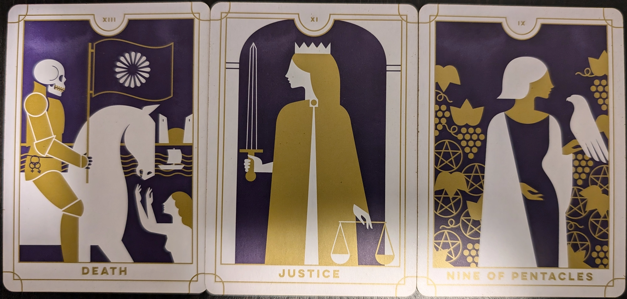 3 cards from the Everyday Tarot deck of Death, Justice, Nine of Pentacles