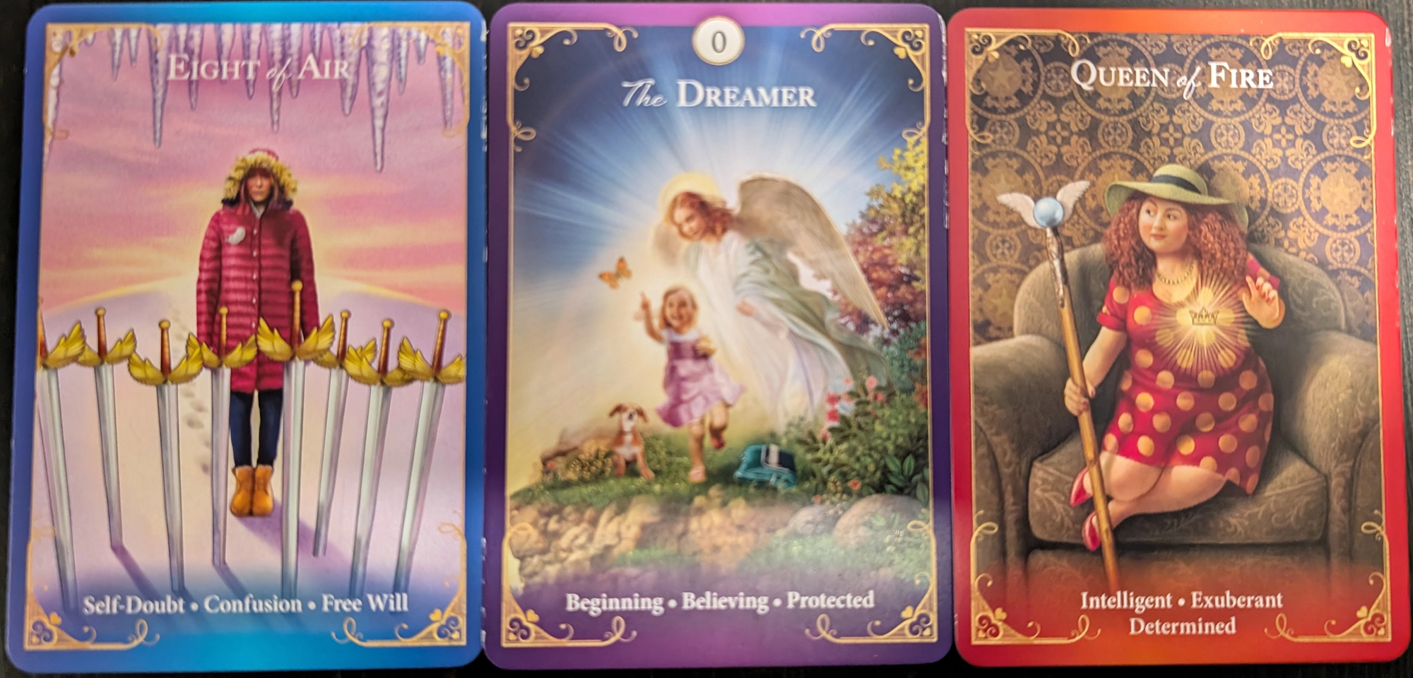 3 cards from the Guardian Angel Messages Tarot of Eight of Air, The Dreamer, Queen of Fire. 