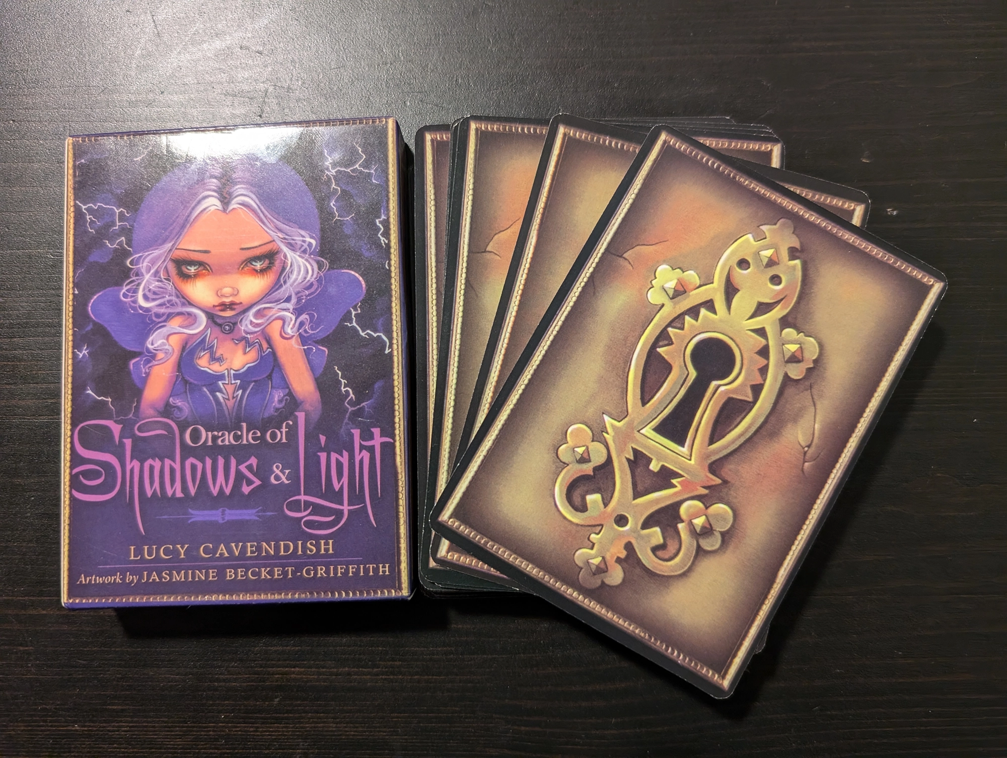 Oracle of Shadows and Light Box and back of card stack