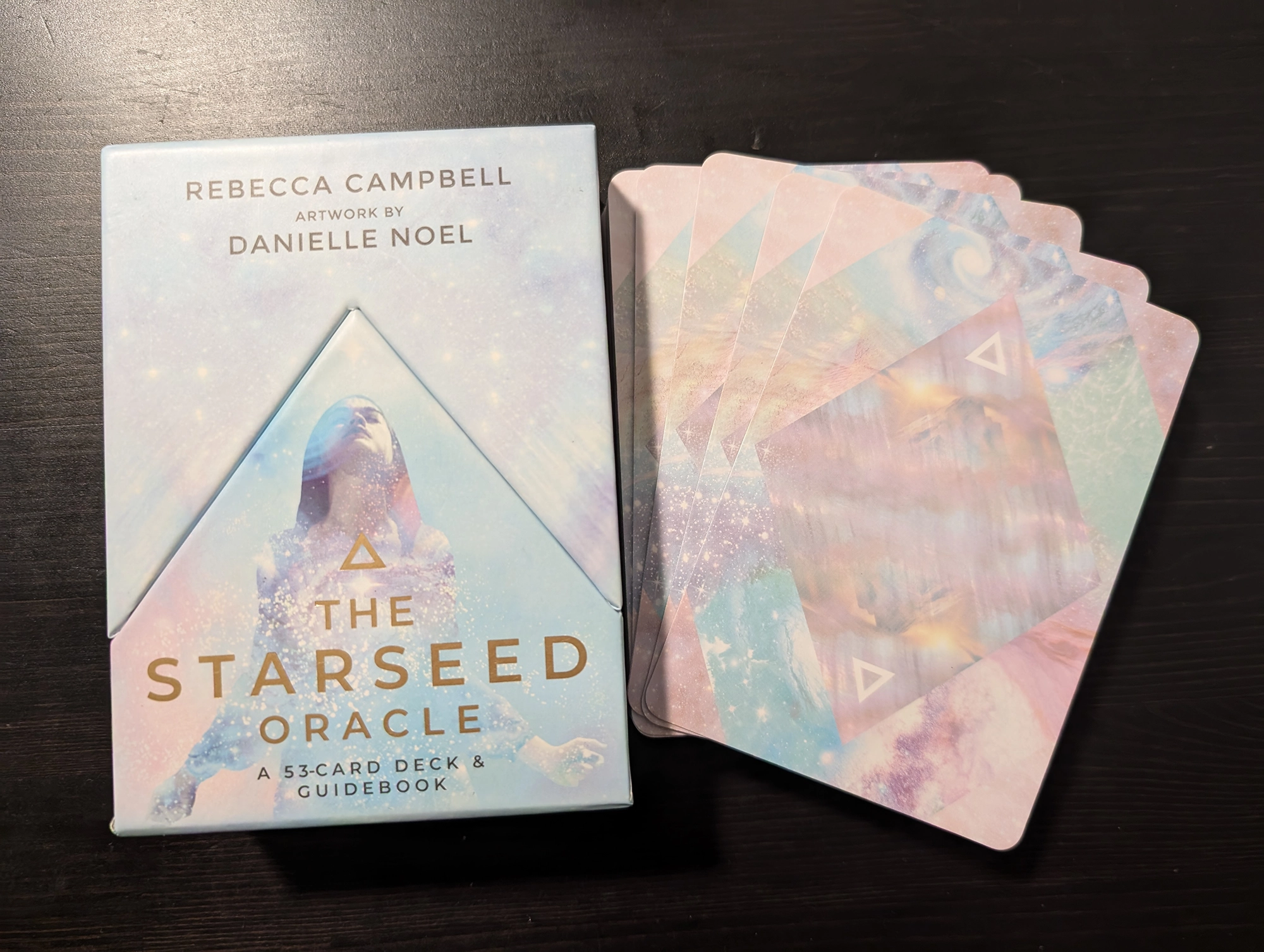 The Starseed Oracle box and back of card stack