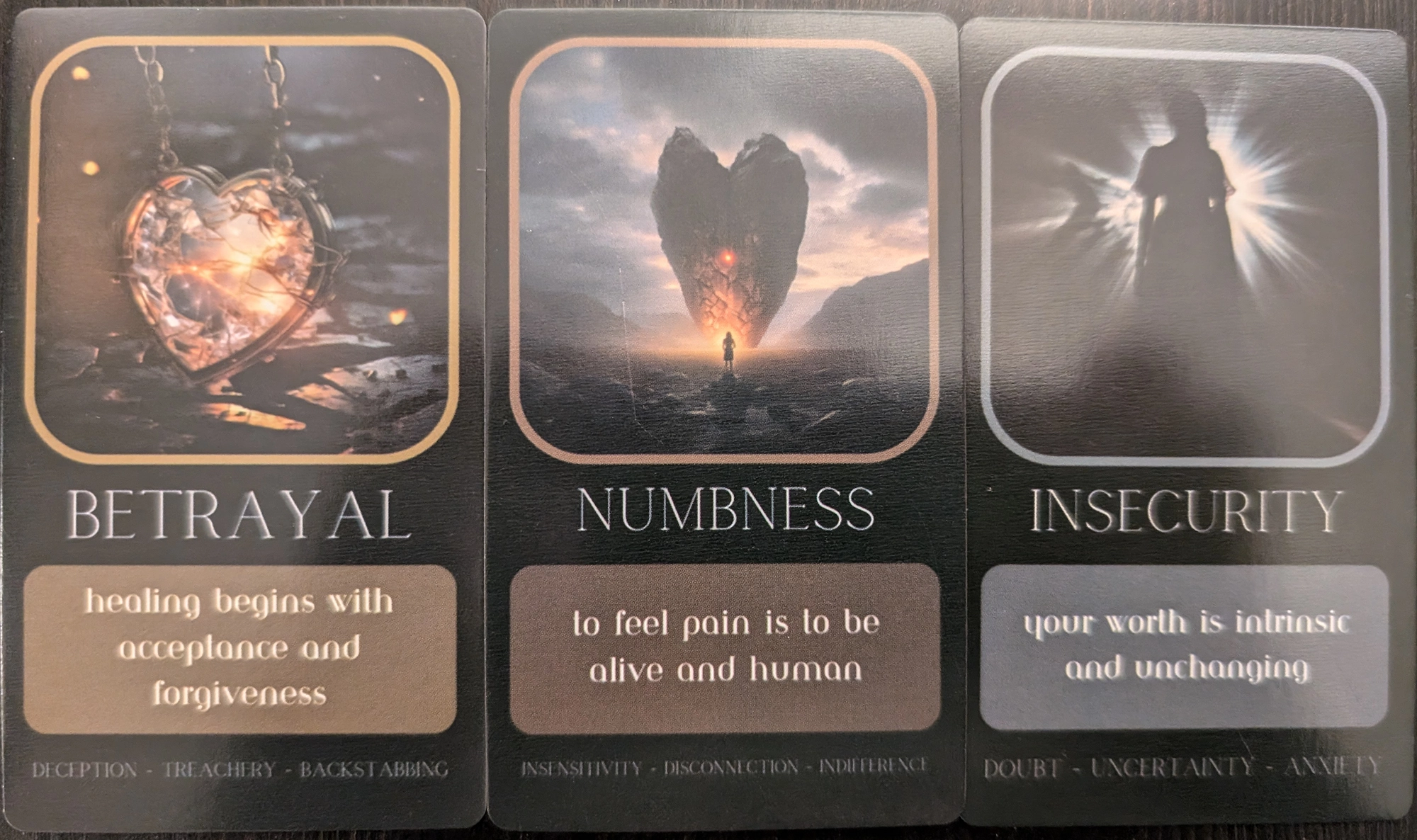 3 cards from the Shadow Work Oracle of betrayal, numbness, and insecurity